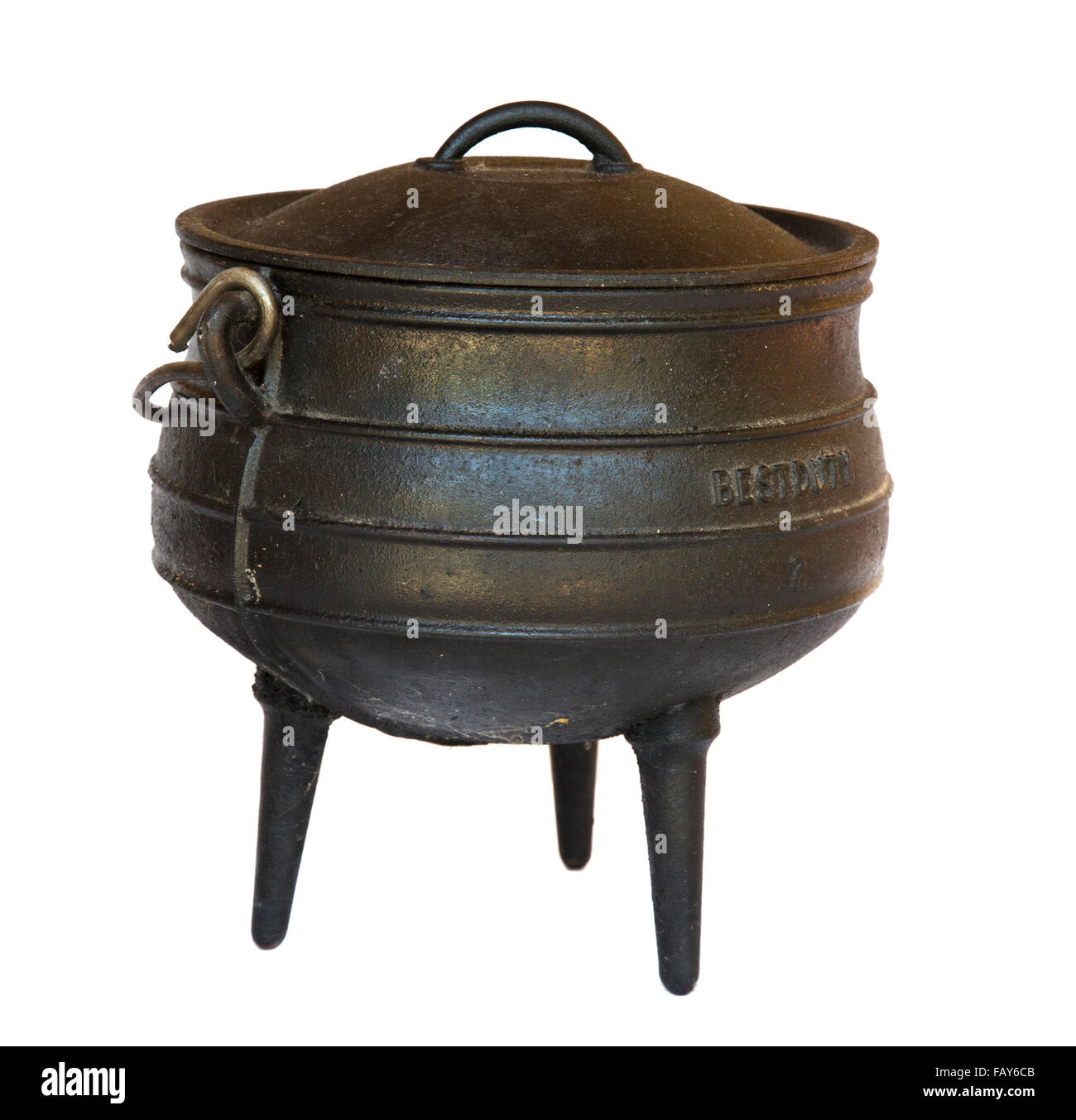 Three-legged black cast iron cooking pot Stock Photo