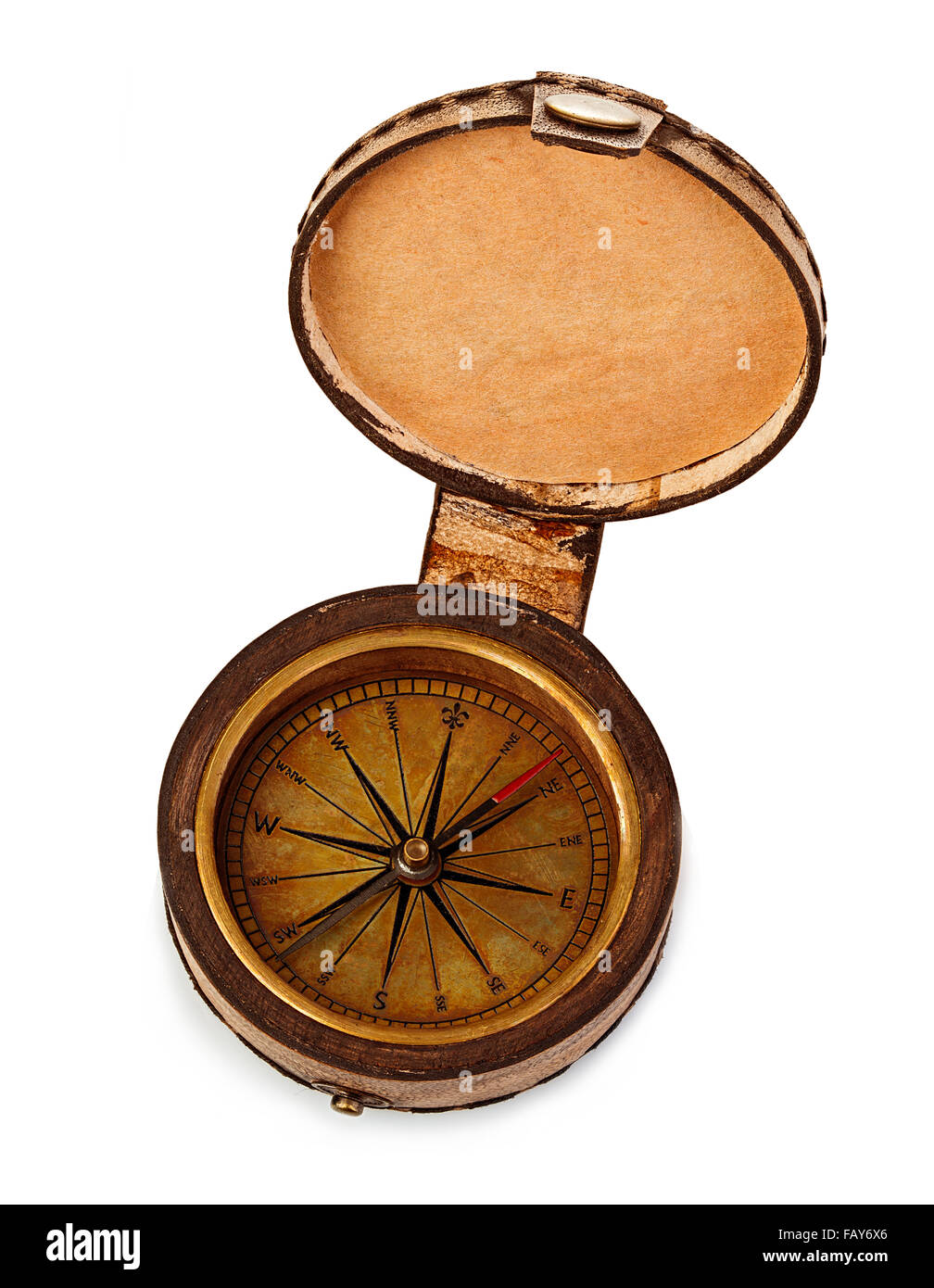 Vintage copper compass in a leather case isolated on a white background. Stock Photo