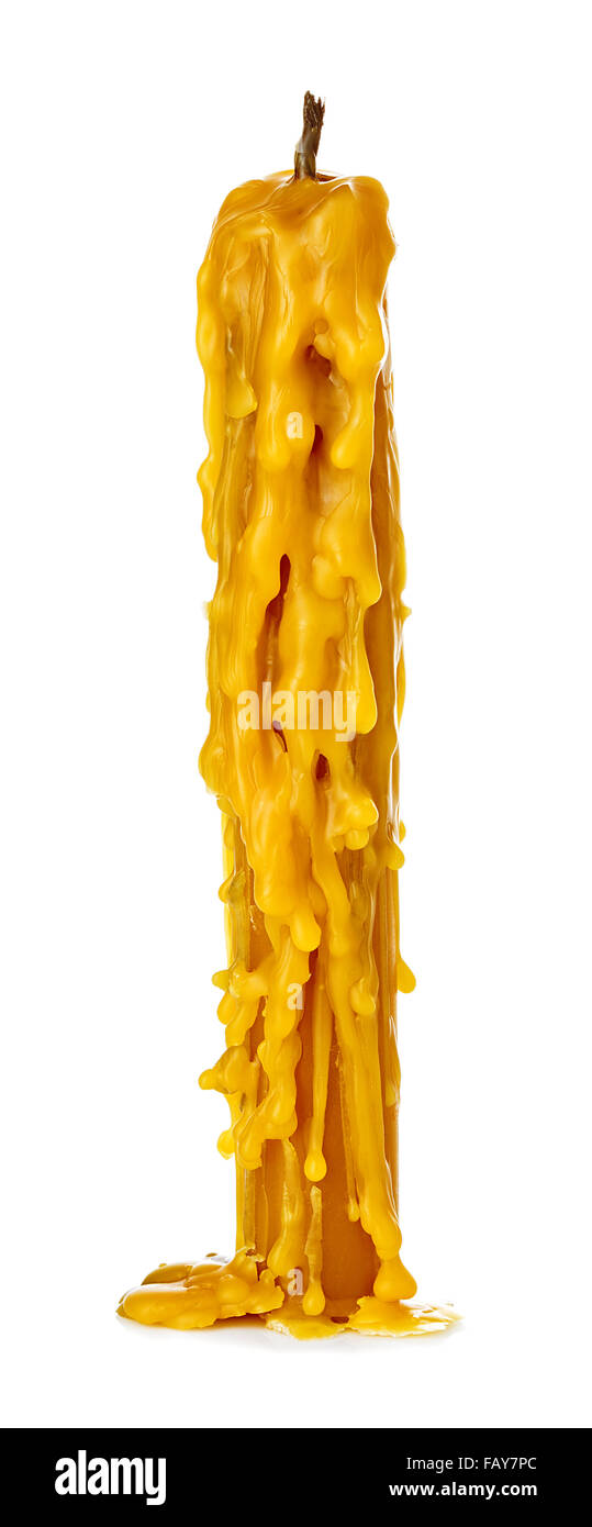 Old vintage church burned candle wax close-up isolated on a white background. Stock Photo