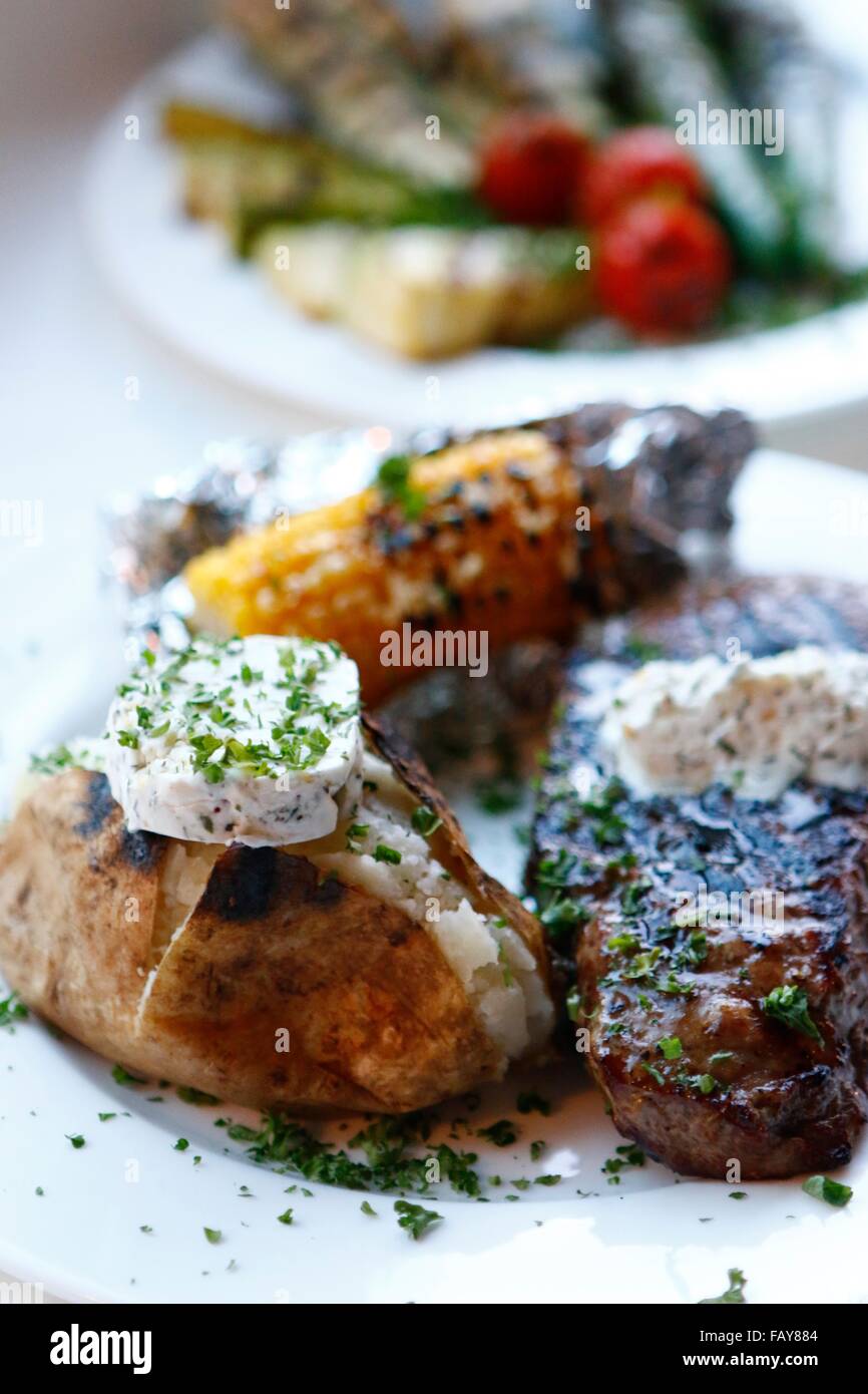 Steak with baked potato hi-res stock photography and images - Alamy