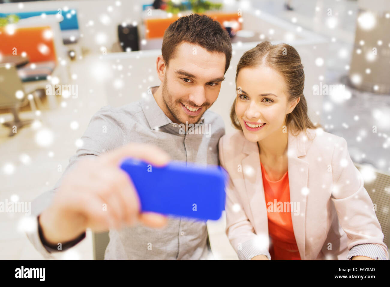 happy couple taking selfie with smartphone in cafe Stock Photo - Alamy