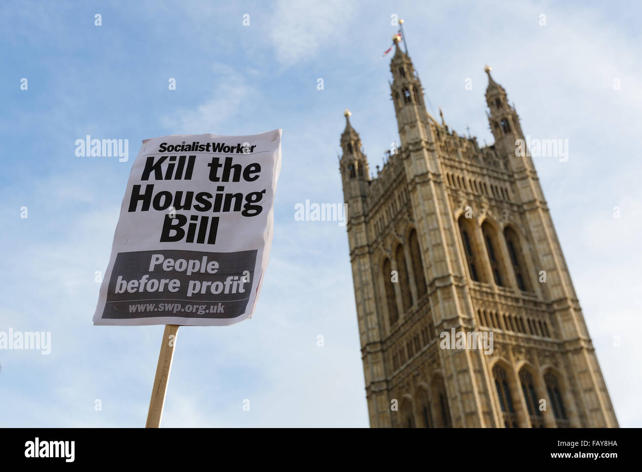 London, UK. 5th January, 2016. Demonstrators from Defend Council Housing (DCH), housing groups, trades unions and Class War protest against the Housing Bill outside the Houses of Parliament in Westminster, London. Members of Parliament (MP’s) are debating the Housing and Planning Bill, which makes provisions about social housing, right to buy, estate agents, rent charges, planning and compulsory purchase. Protesters claim that the Housing Bill, if passed will effectively end council housing. Stock Photo