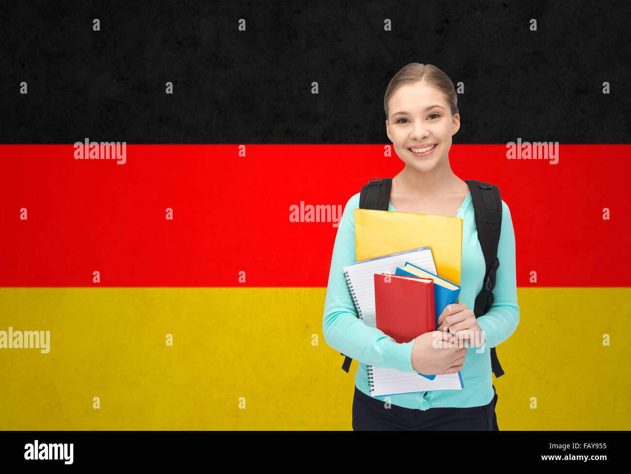 happy and smiling teenage student girl with books Stock Photo - Alamy