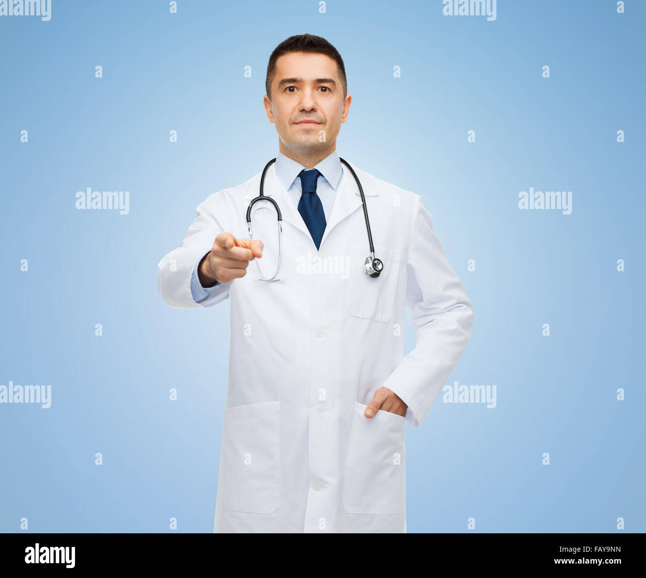 Pointing white coat doctor hi-res stock photography and images - Alamy
