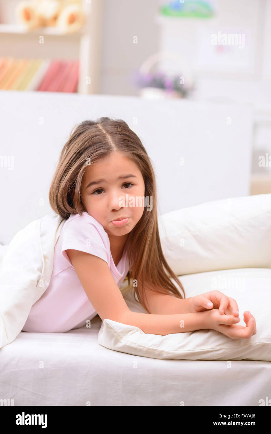 Little girl resting at home Stock Photo