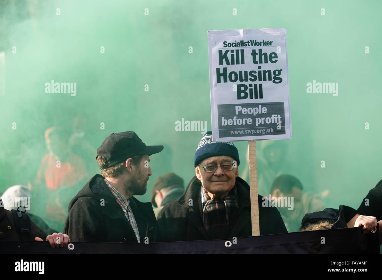 London, UK. 5th January, 2016. Demonstrators from Defend Council Housing (DCH), housing groups, trades unions and Class War protest against the Housing Bill outside the Houses of Parliament in Westminster, London. Members of Parliament (MP’s) are debating the Housing and Planning Bill, which makes provisions about social housing, right to buy, estate agents, rent charges, planning and compulsory purchase. Protesters claim that the Housing Bill, if passed will effectively end council housing. Stock Photo