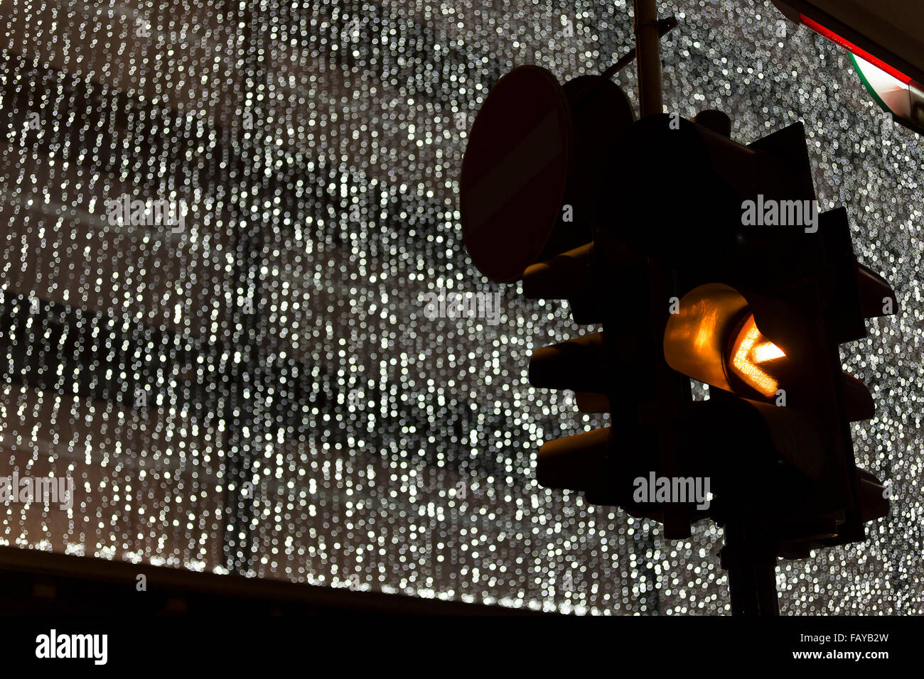 traffic light and christmas decoration on background Stock Photo