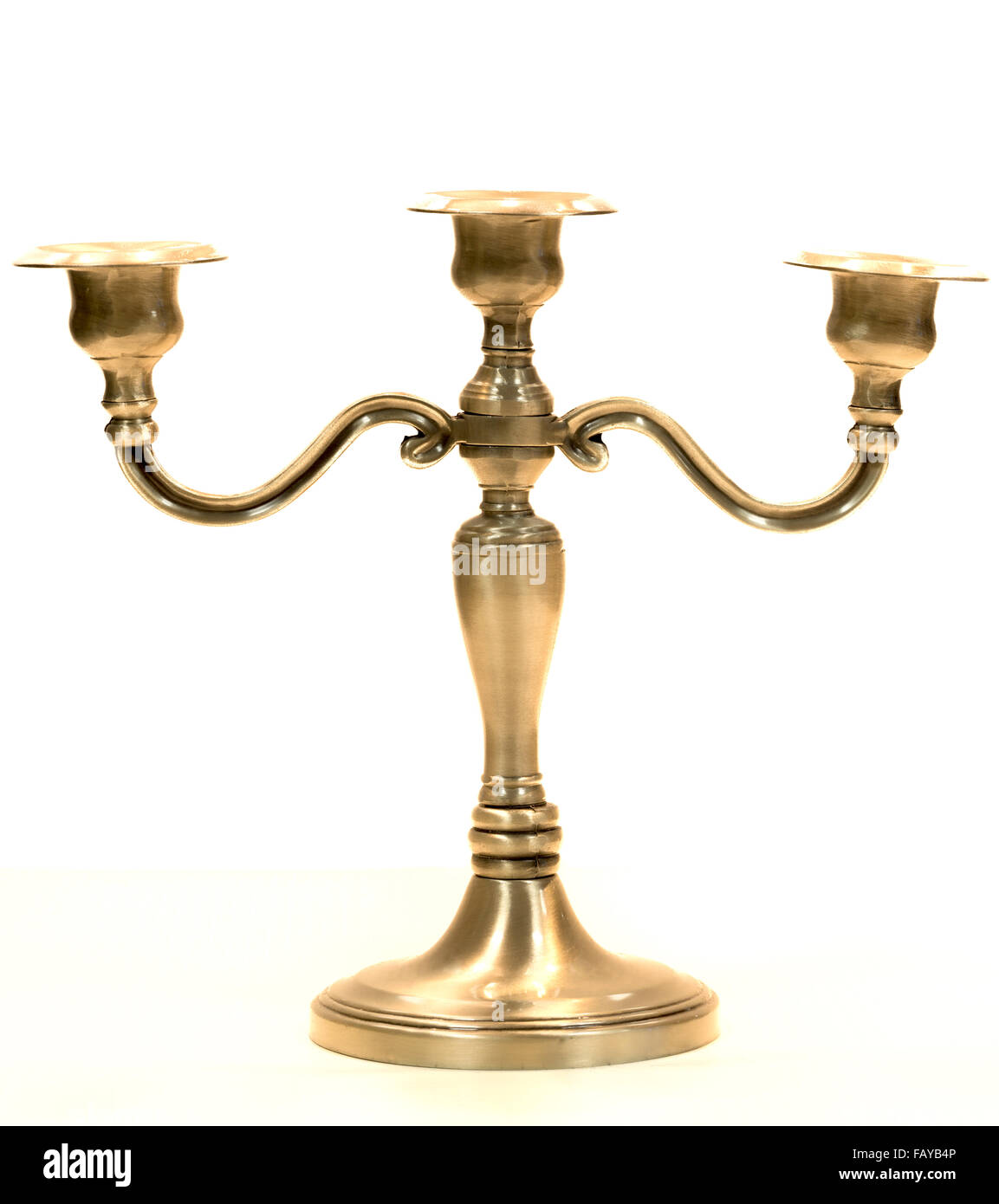 Candlestick with three candles Stock Photo Alamy