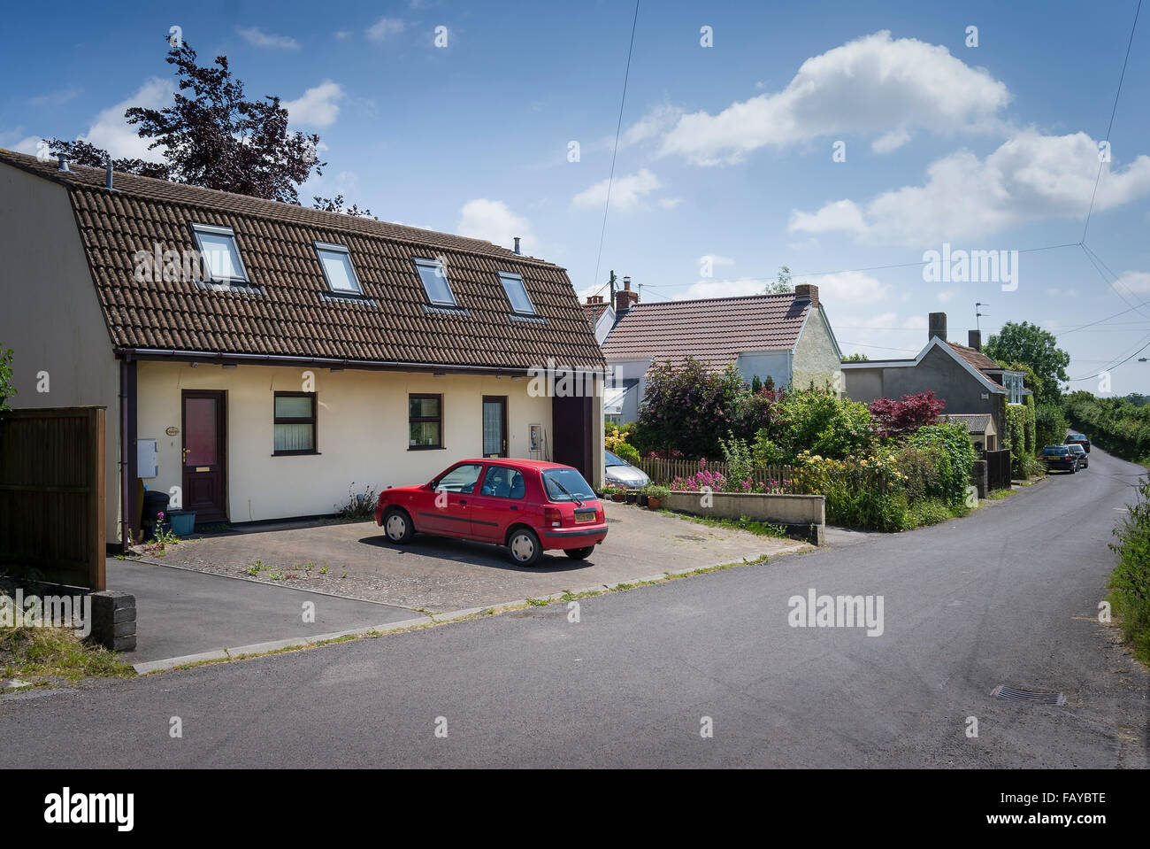 Starter homes and old cottages in North End Clutton Somerset UK Stock
