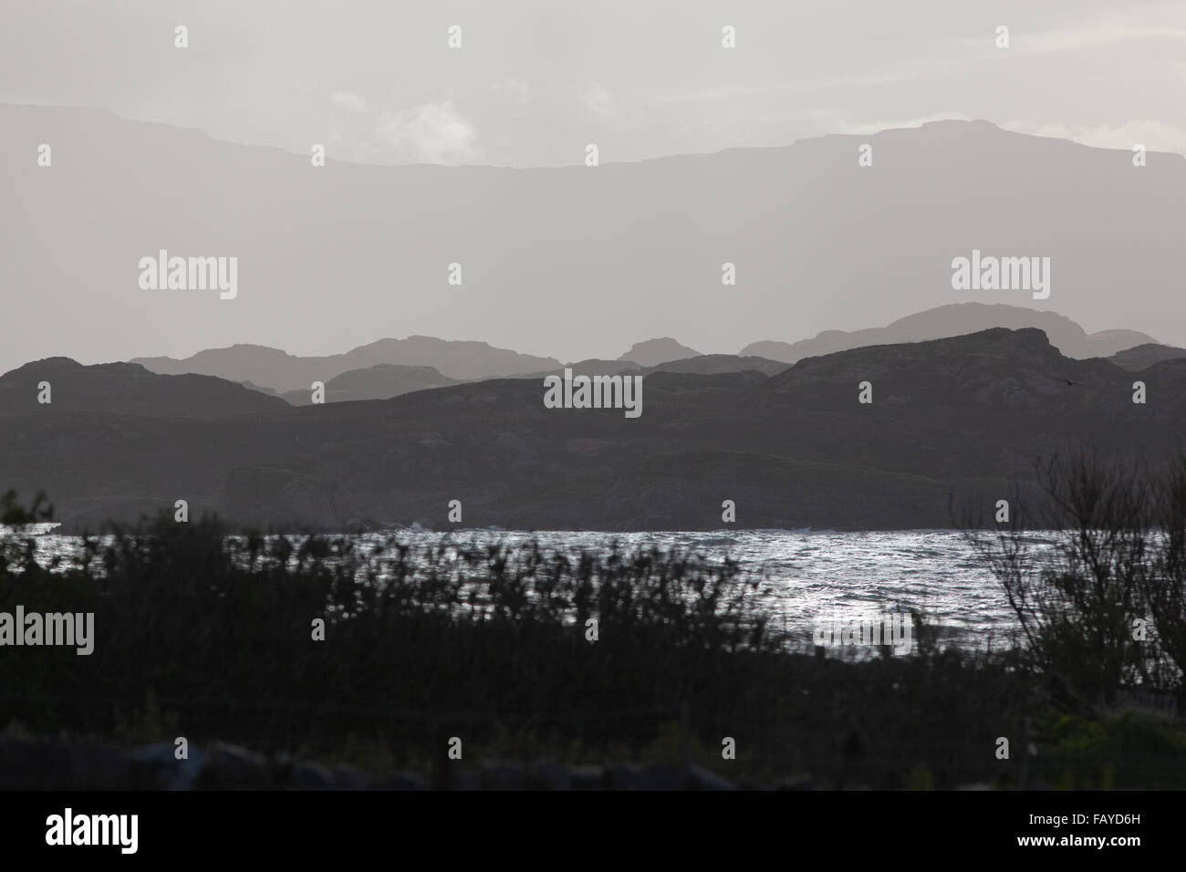 Mull from across The Sound of Iona. Evening light. Inner Hebrides. Argyll and Bute. West coast of Scotland. Stock Photo