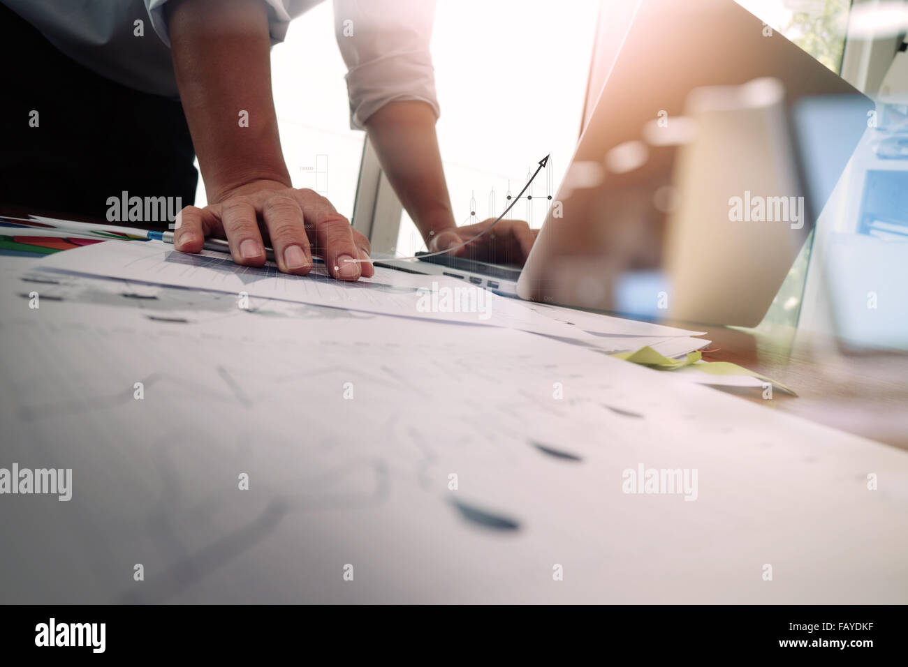 Double exposure of businessman hand working with new modern computer and business strategy as concept Stock Photo