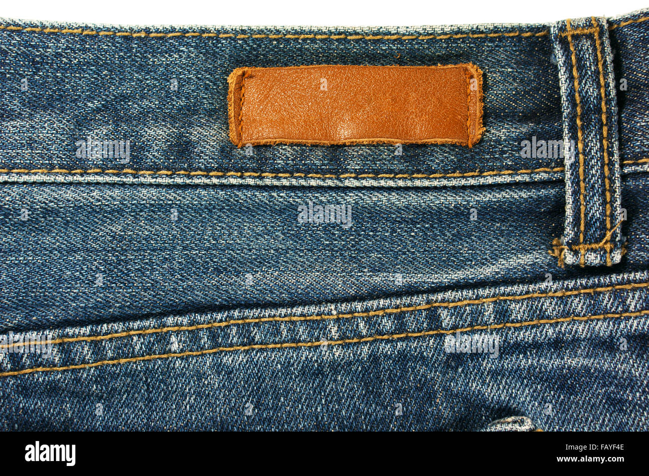 Jeans with leather label texture and background Stock Photo - Alamy