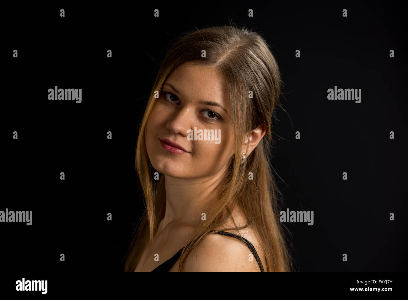 portrait of young woman on the black background Stock Photo - Alamy