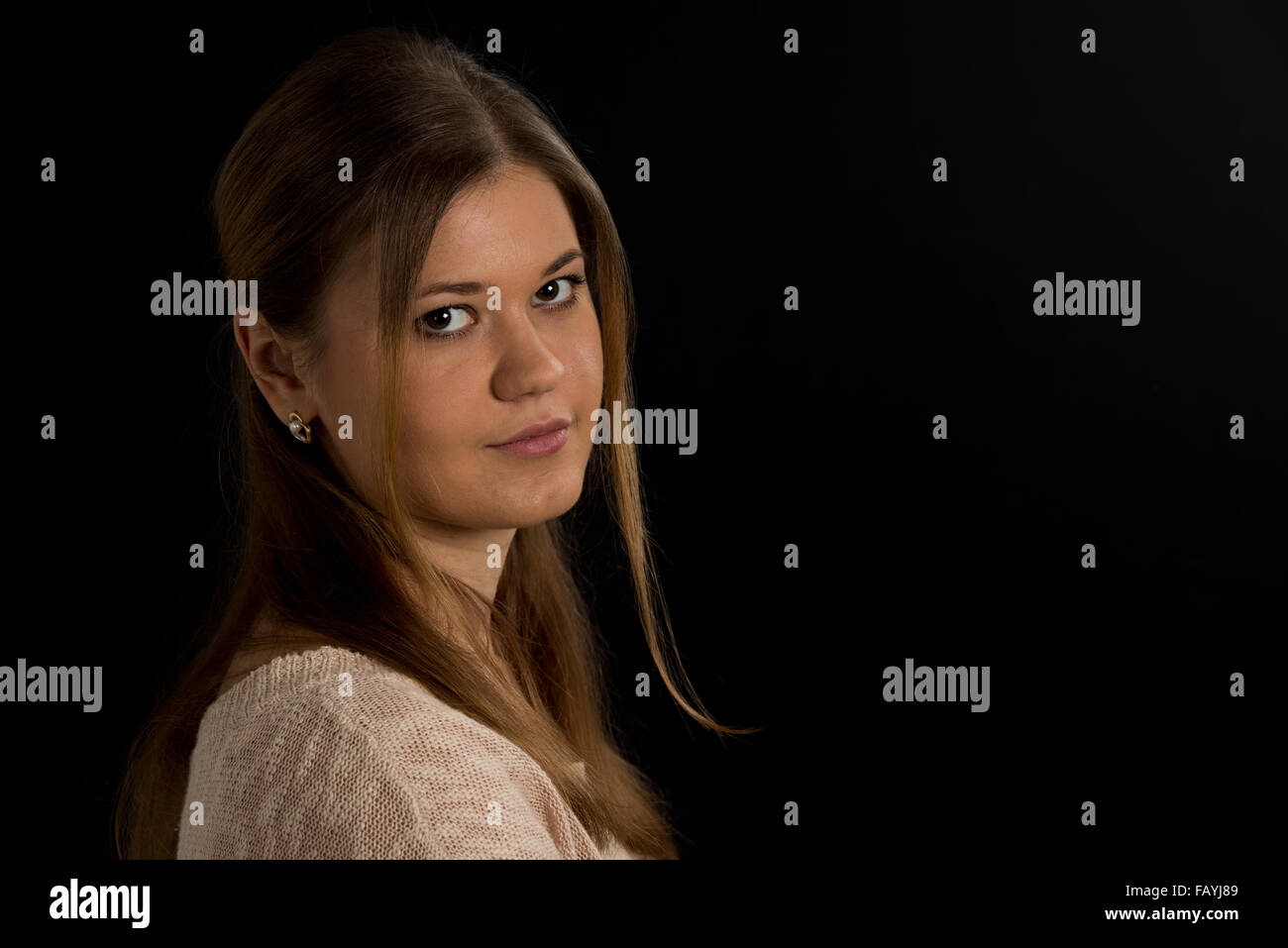 portrait of young woman on the black background Stock Photo - Alamy