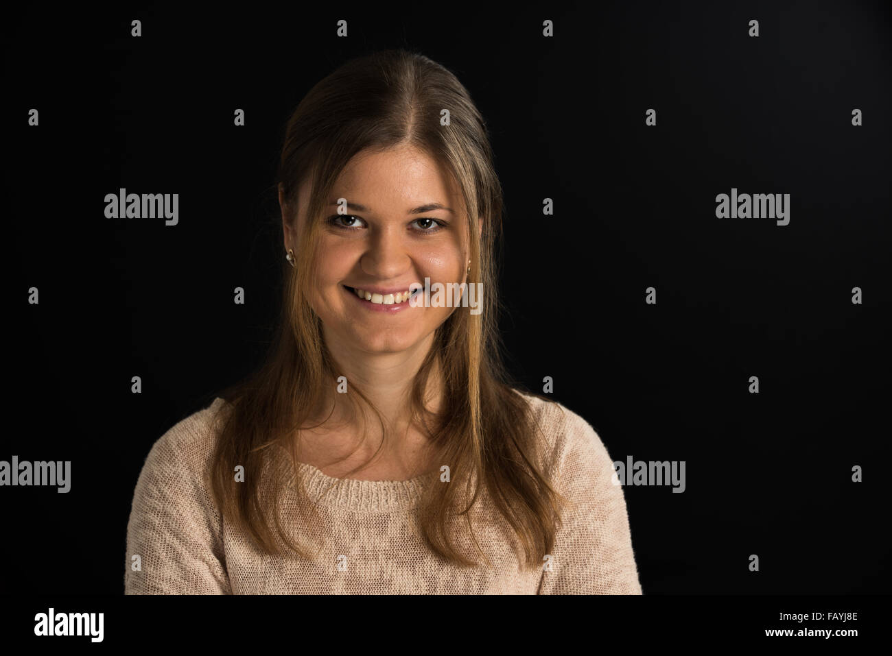 portrait of young woman on the black background Stock Photo - Alamy