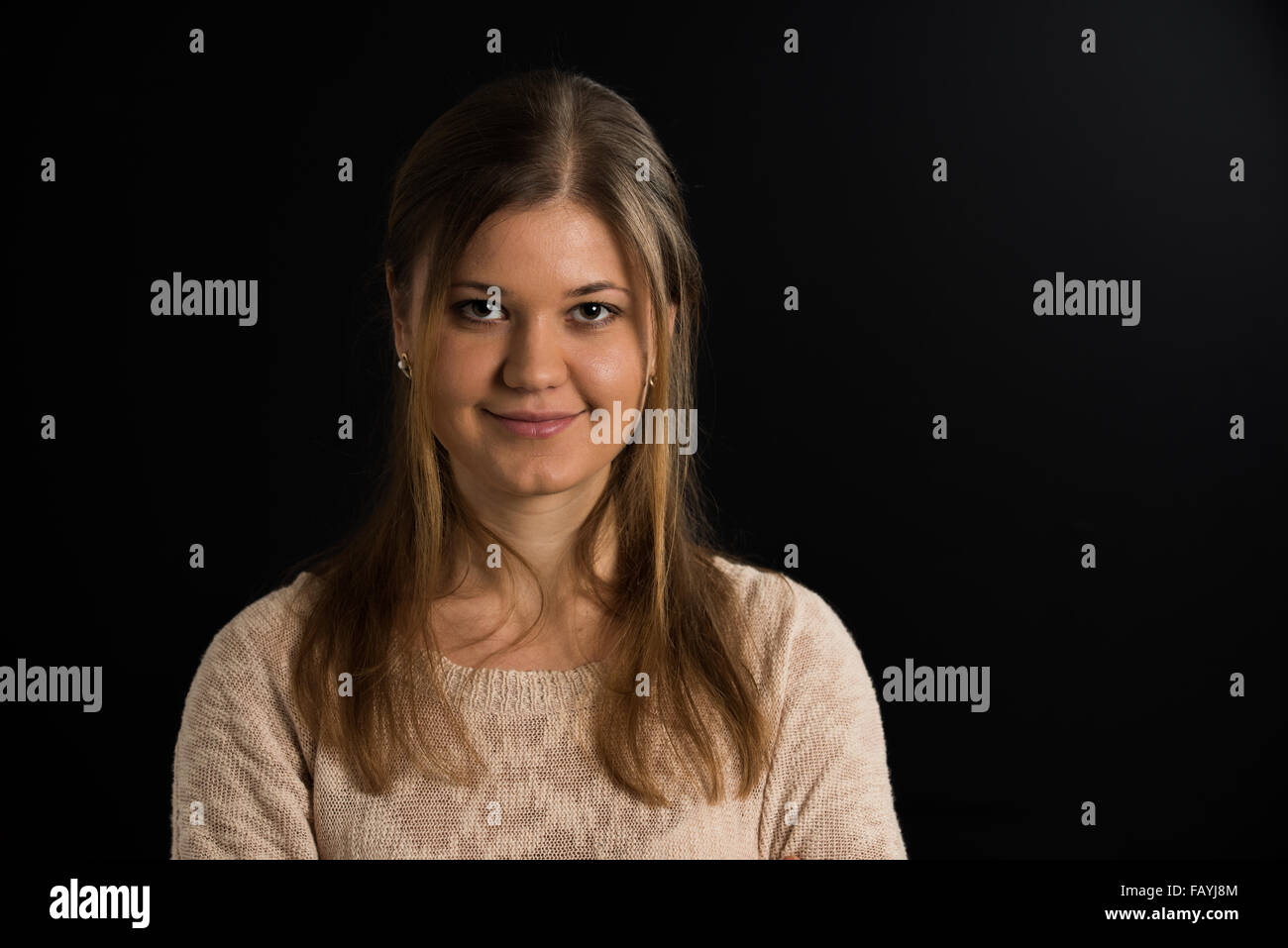 portrait of young woman on the black background Stock Photo - Alamy