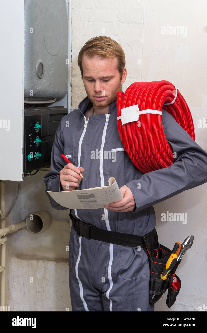 Technician  for heating system Stock Photo