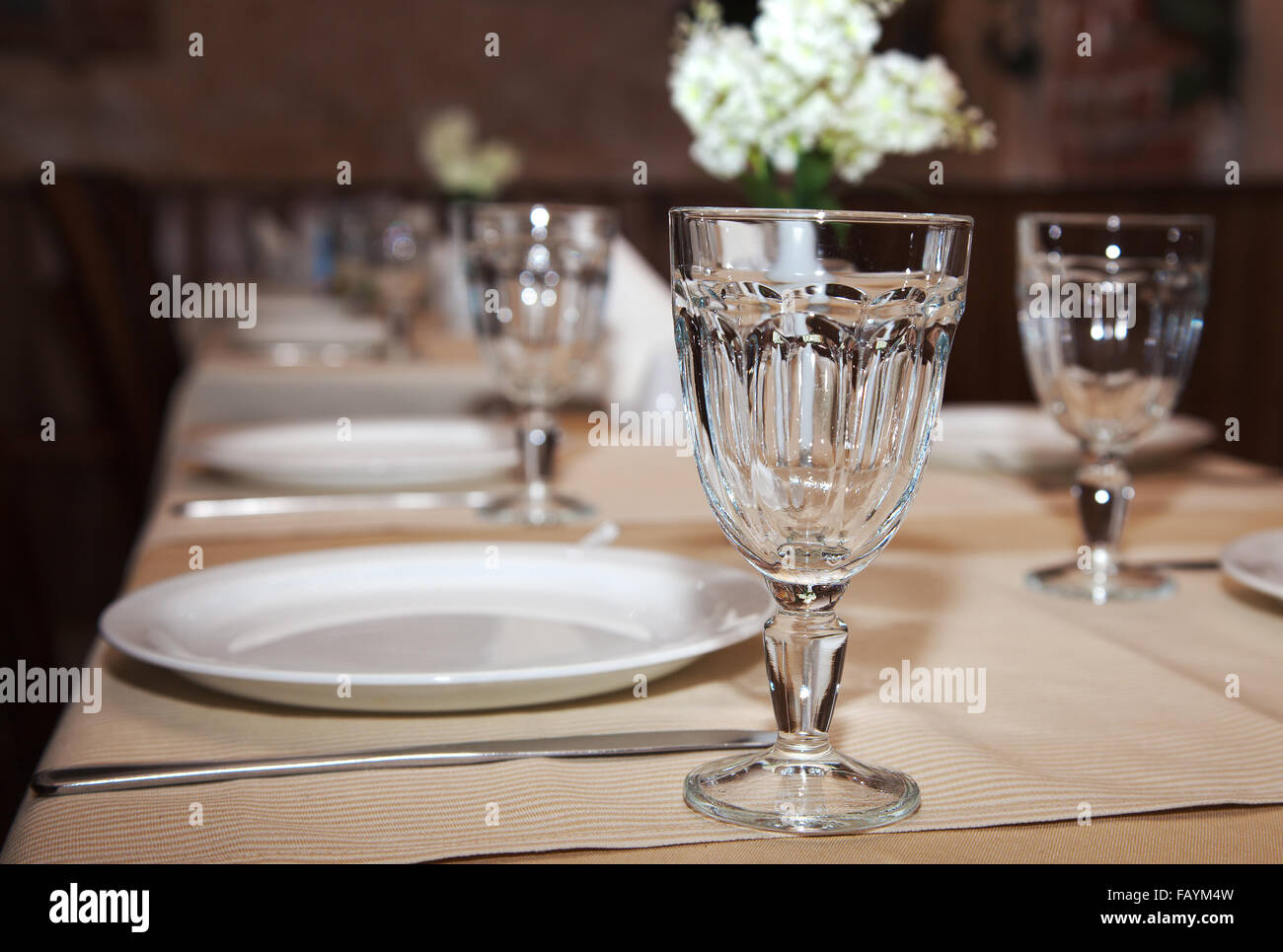 glasses and plates on table in restaurant Stock Photo Alamy