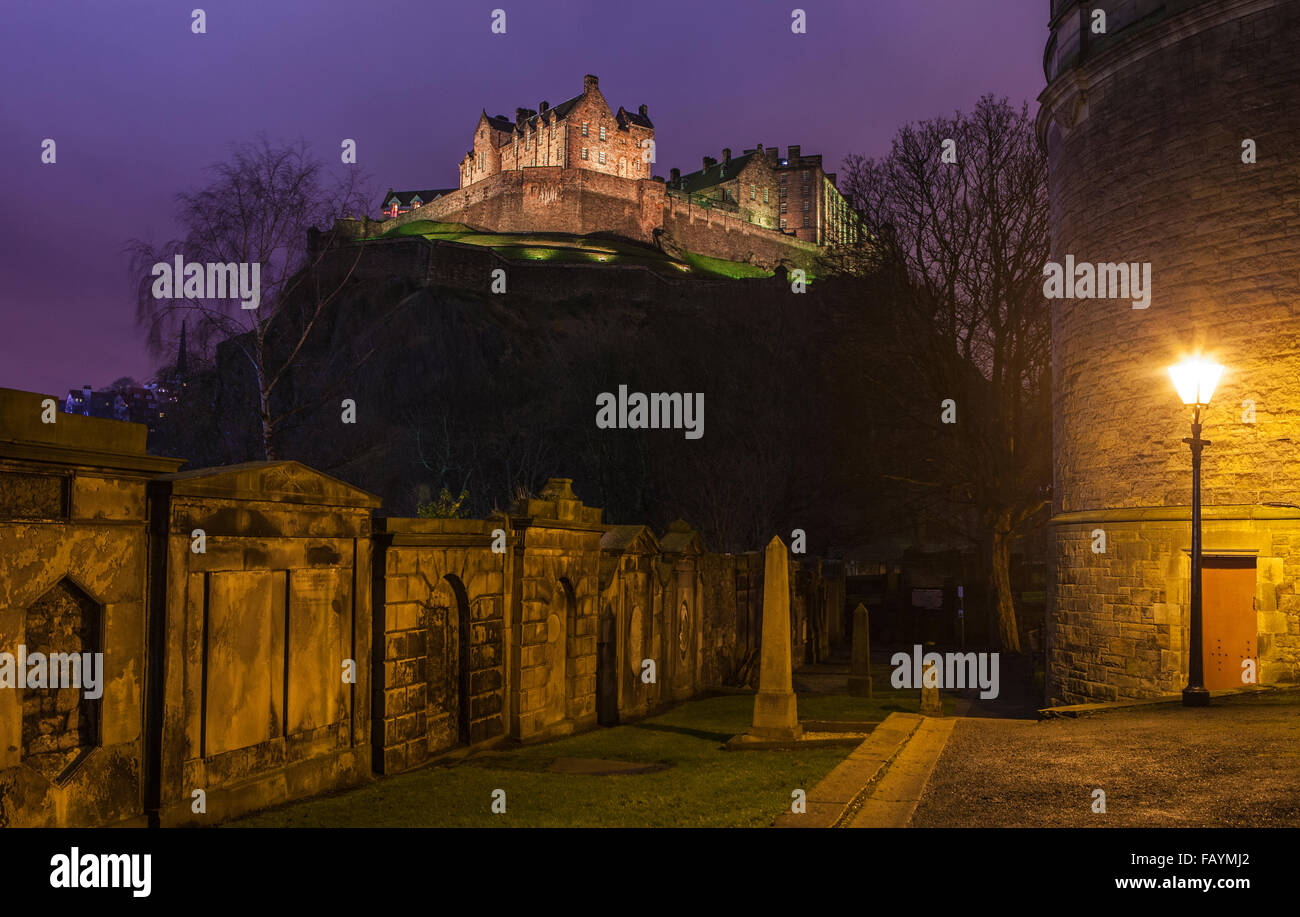 View of the magnificent Edinburgh Castle from the churchyard of St. Cuthberts Church. Stock Photo