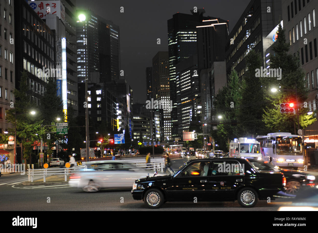 Traffic at nights and skyscrapers in Shinjuku Tokyo Japan Stock Photo