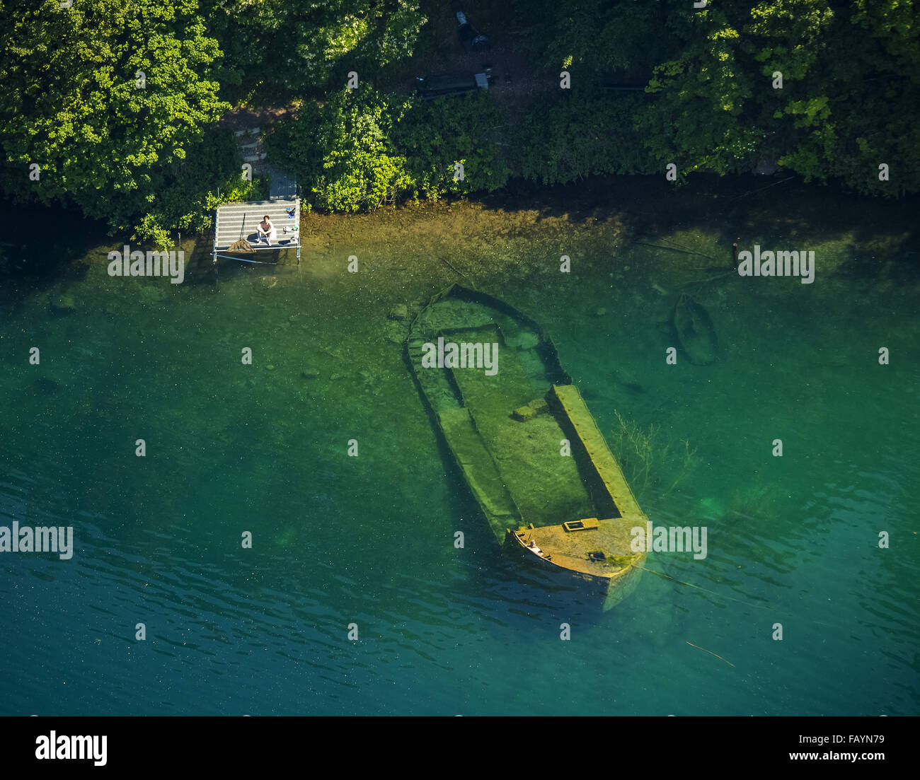 Aerial view, sunken boat with fishermen on Escher lake in Cologne, green turquoise waters, Cologne, Rhineland, Stock Photo