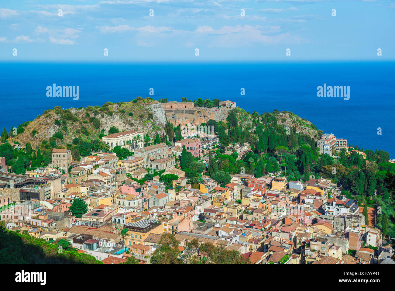Taormina landscape Sicily, aerial cityscape view of Taormina, showing the auditorium of the ancient Greek theater (center). Stock Photo