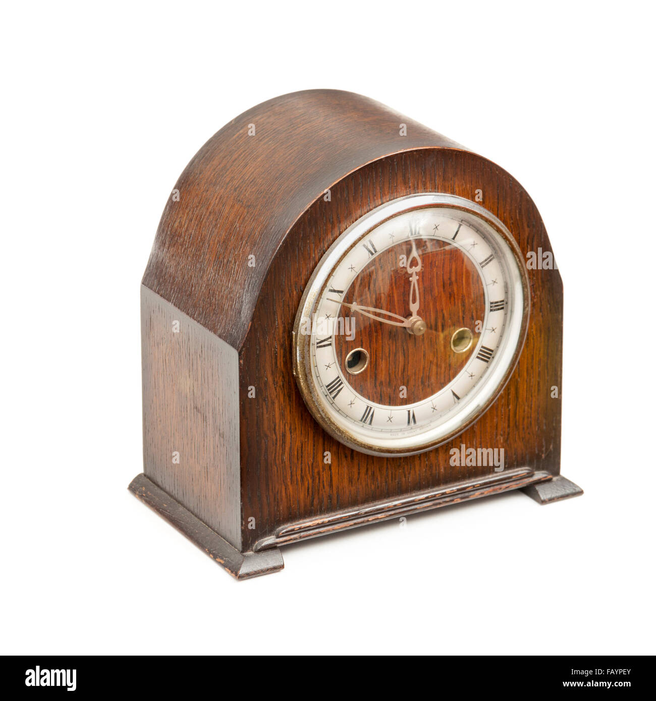 Antique mantel clock in oak case with Smiths movement, supplied by H.H. Bridges of Calne, Wiltshire, UK Stock Photo