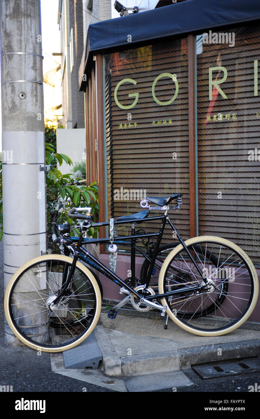 Bicycle in front of a Japanese restaurant in Rappongi Tokyo Japan Stock Photo