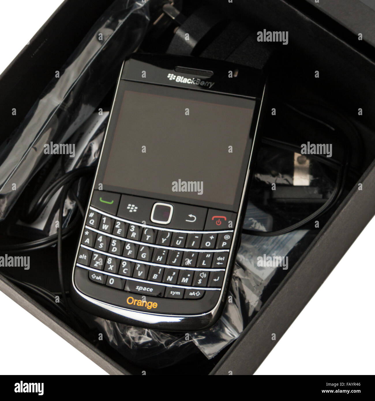 Blackberry Bold 9900 smartphone from 2011 with full physical QWERTY keyboard Stock Photo