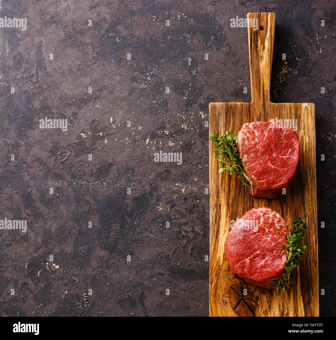 Raw fresh marbled meat Steak filet mignon on black background Stock Photo