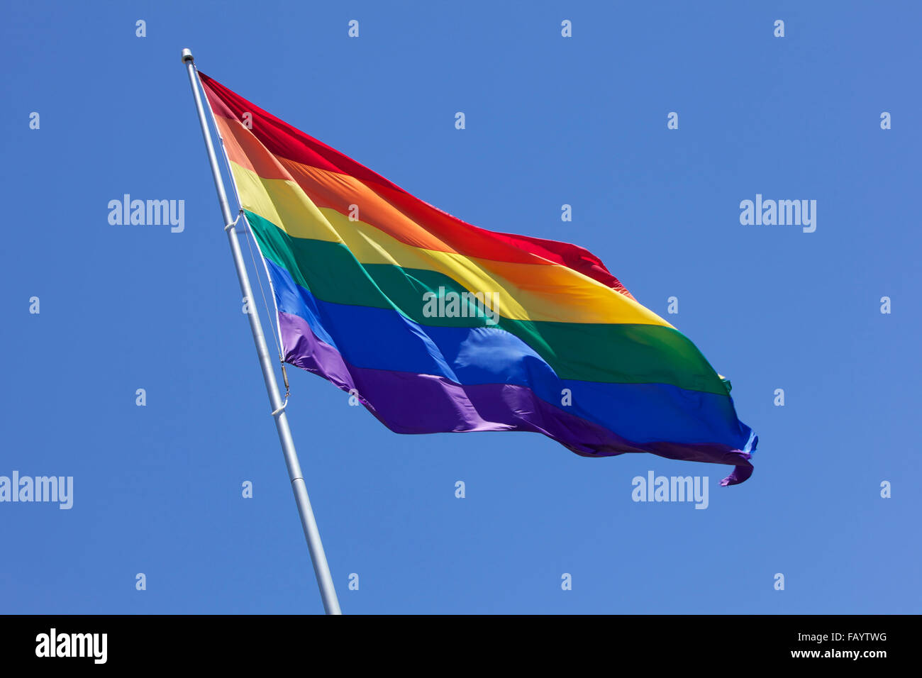 Rainbow flag with blue sky in San Francisco Stock Photo