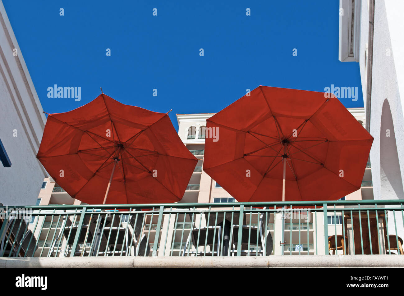 United States of America, Florida: red beach umbrellas on a  white building in Fort Lauderdale, Ft. Lauderdale, skyline, relax Stock Photo