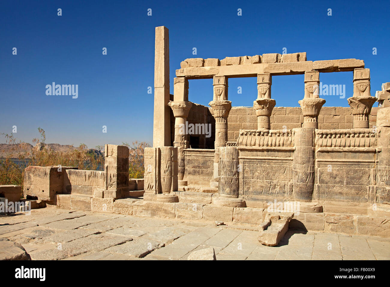 Temple of Hathor, part of Isis / Philae Temple complex on Agilkia / Agilika Island in reservoir of the Old Aswan Dam, Egypt Stock Photo