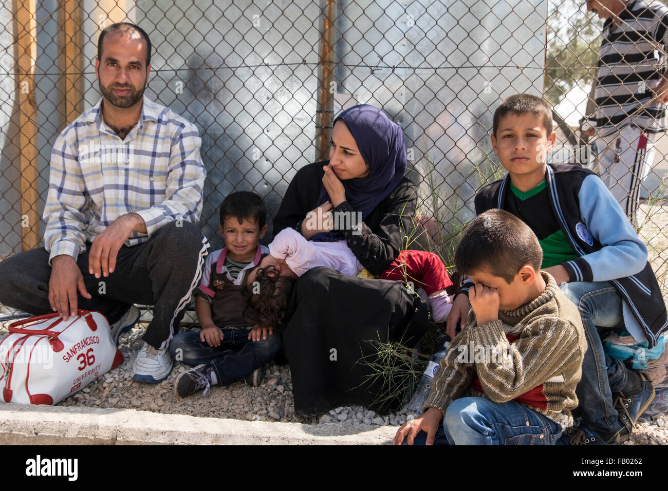 An Iraqi refugee family seeks refuge in the Kara Tepe transit camp in Mytillene, Lesvos, after crossing by raft from Turkey. Stock Photo