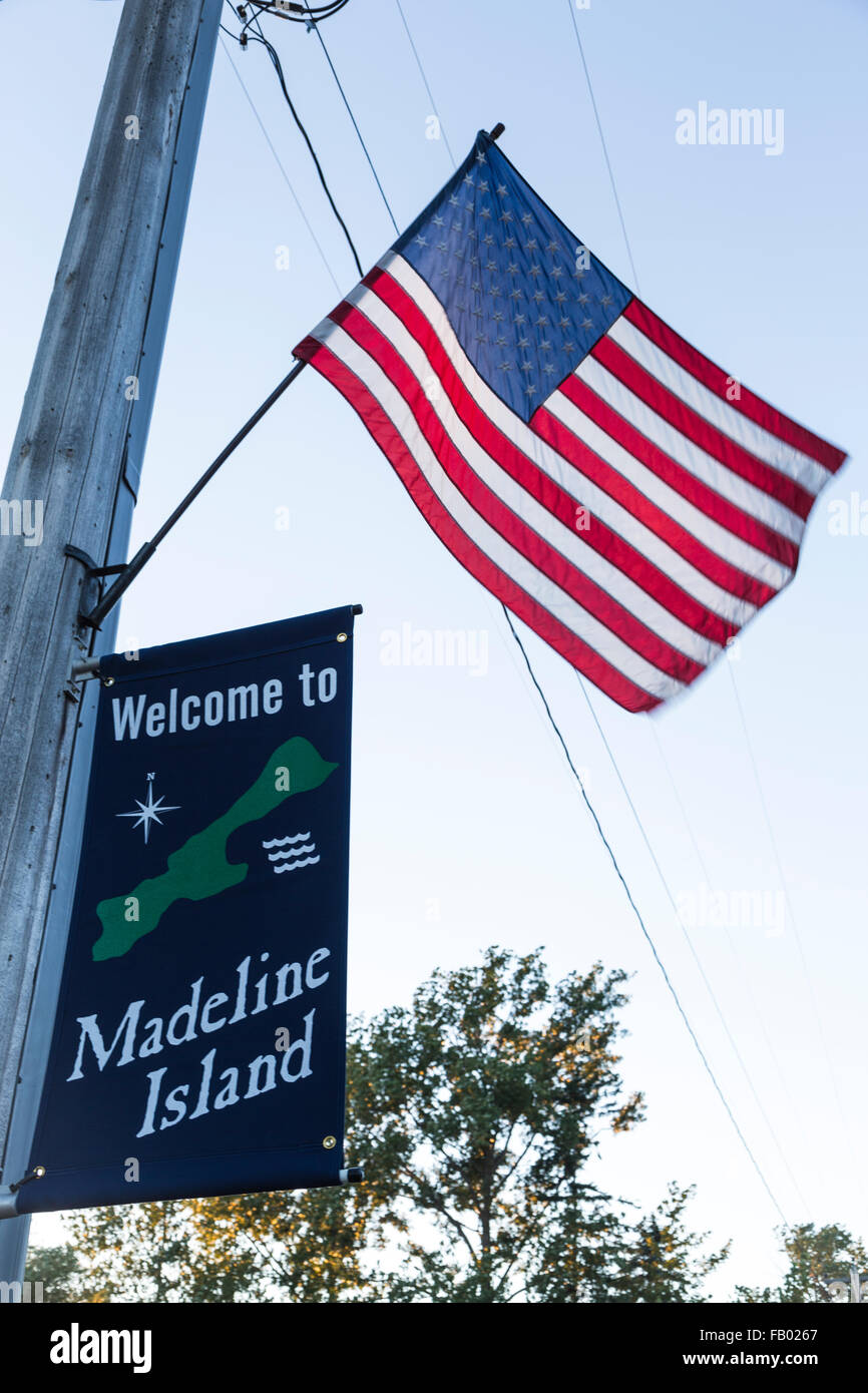 Welcome sign and American flag as you enter the town of Madeline Island Stock Photo