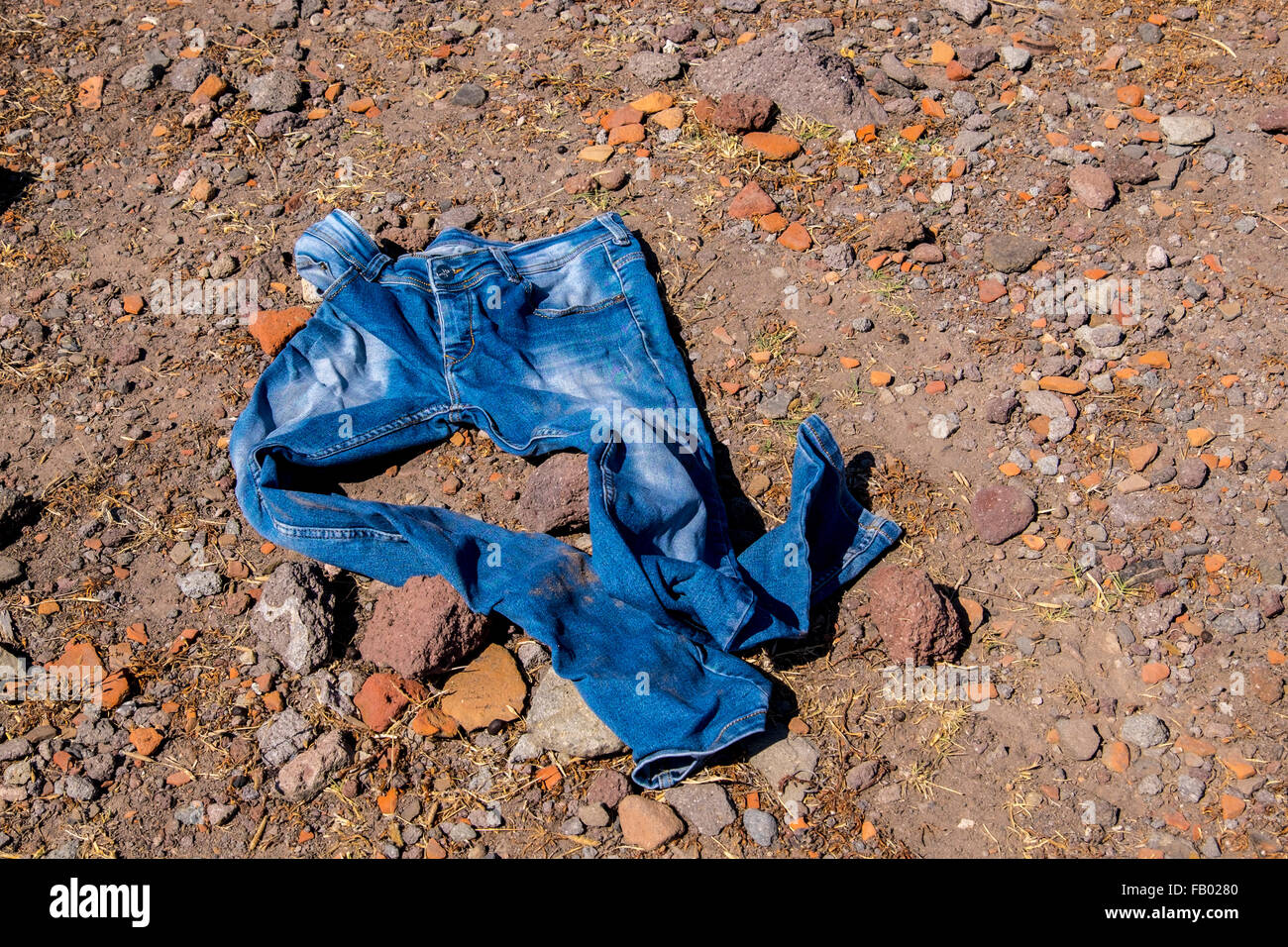 Pair of wet jeans left behind by a refugee crossing from Turkey to the Greek island of Lesvos Stock Photo