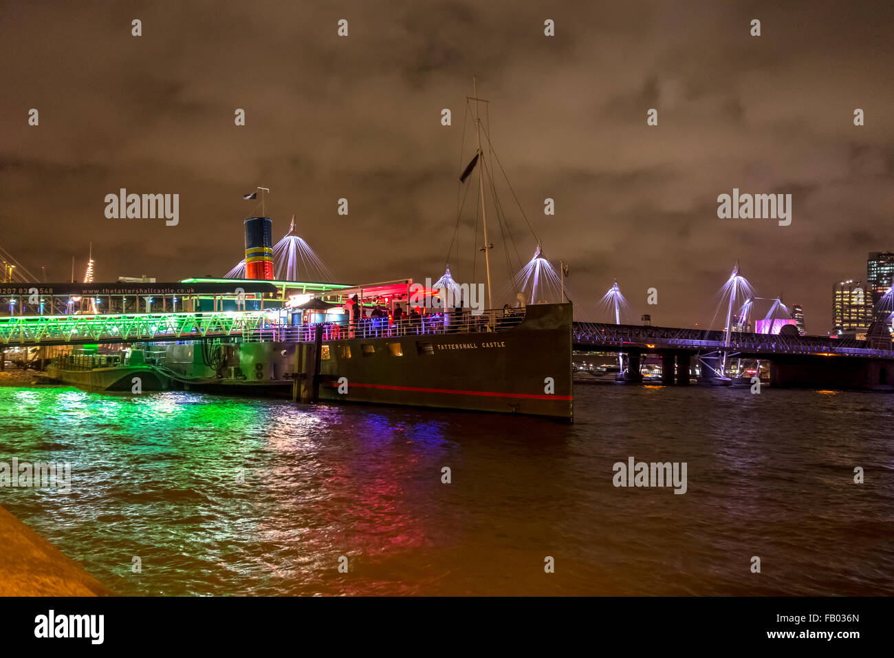 A former passenger ferry was converted to a bar-restaurant called Tattershall Castle bar and restaurant is moored on the River Thames. Stock Photo