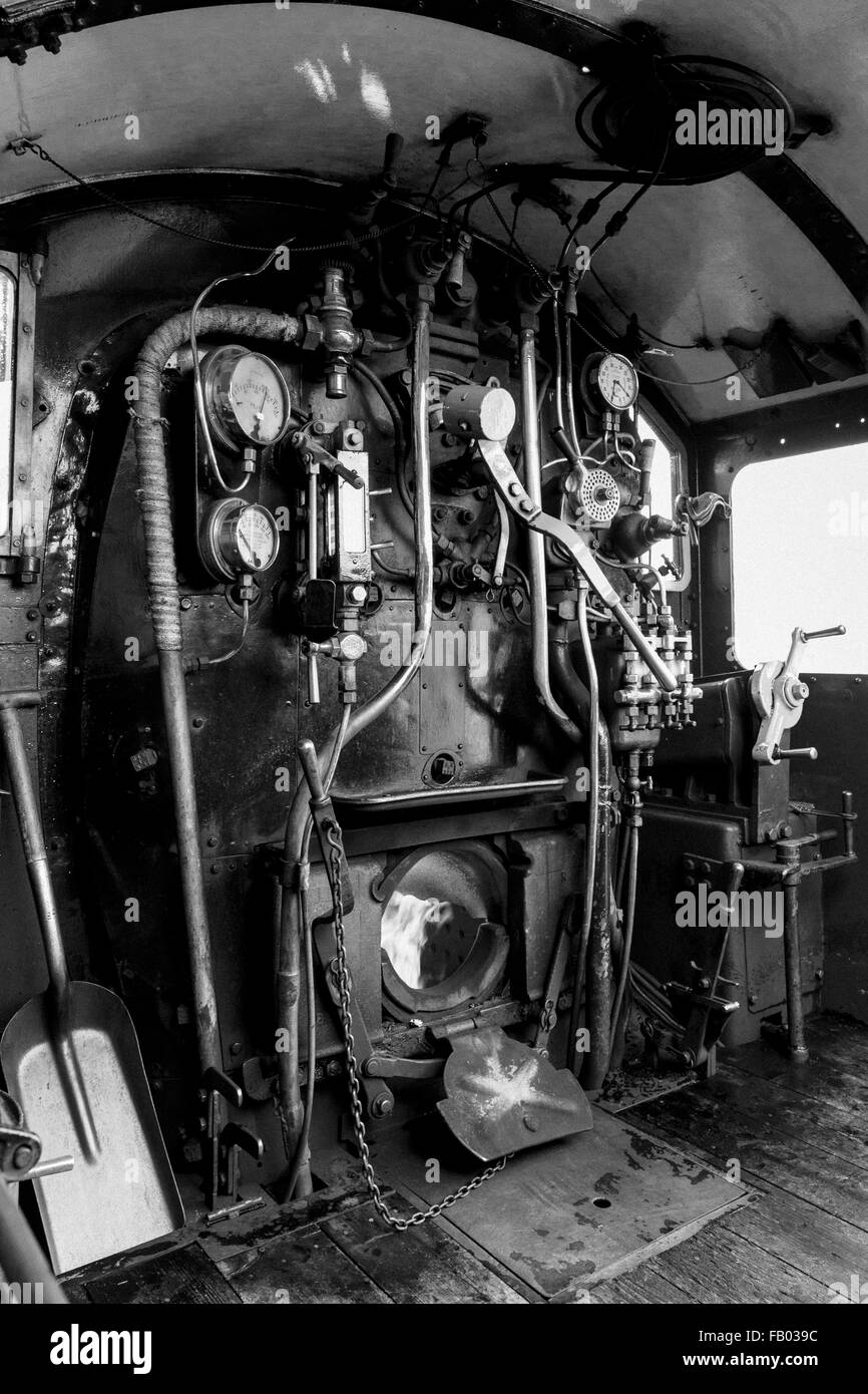 The footplate and controls of 7827 Lydham Manor steam locomotive at Kingswear station on the Dartmouth Steam Railway, Devon Stock Photo