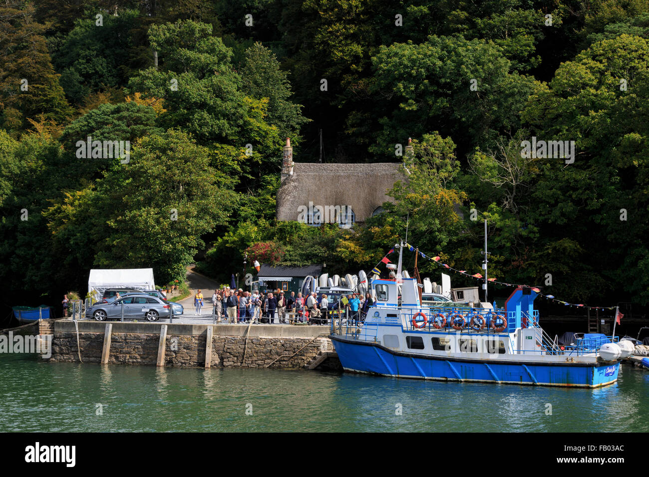 Tourists throng Greenway Quay, the former home of acclaimed crime writer Agatha Christie, on the River Dart, Devon Stock Photo