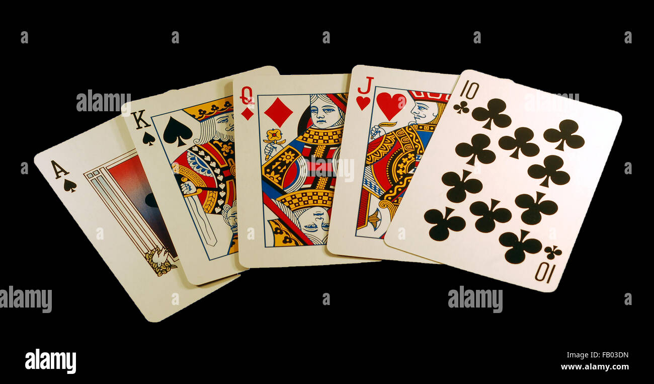 poker,poker hand,winning hand,cards,gambling,ace,king,queen,jack,club,black background Stock Photo