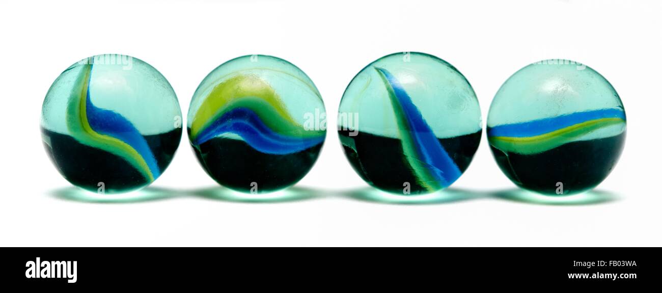 4 glass marbles Stock Photo