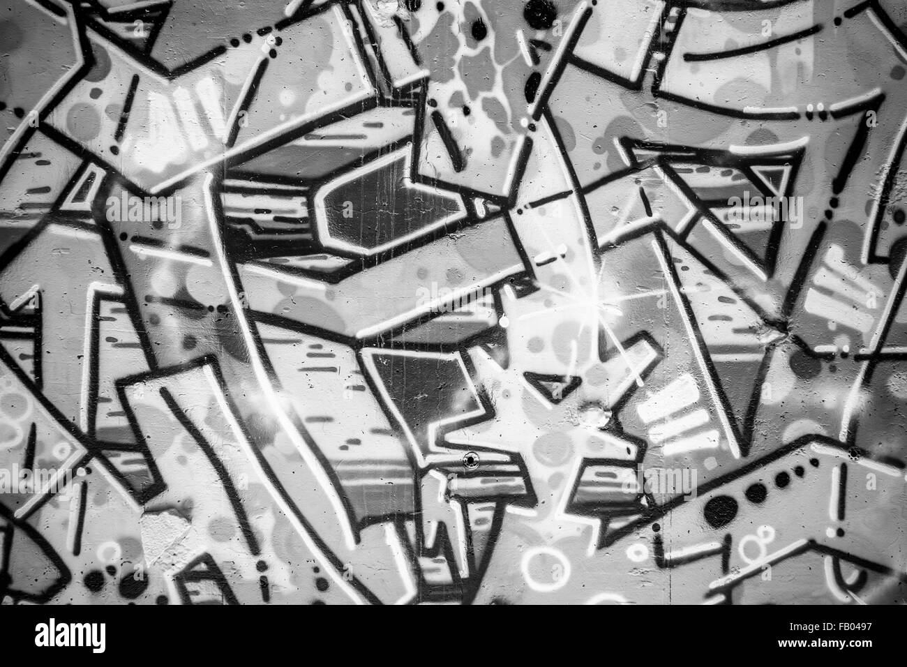 grunge, a city wall with graffiti in black and white, urban art Stock