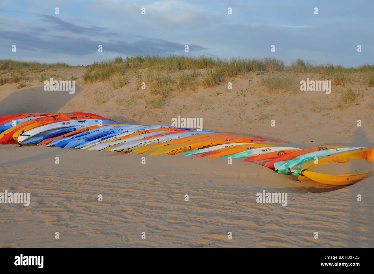 Colorful kayak boats on a sandy beach , La Tranche-sur-Mer, France Stock Photo