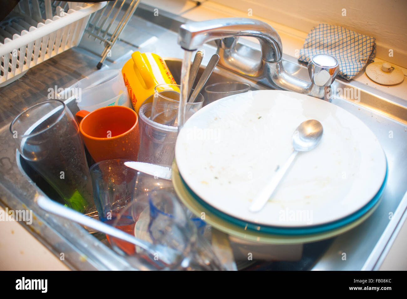 Dirty dishes in sink Stock Photo Alamy