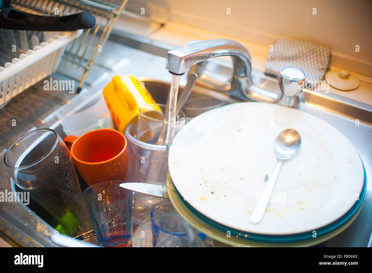 Dirty dishes in sink Stock Photo - Alamy