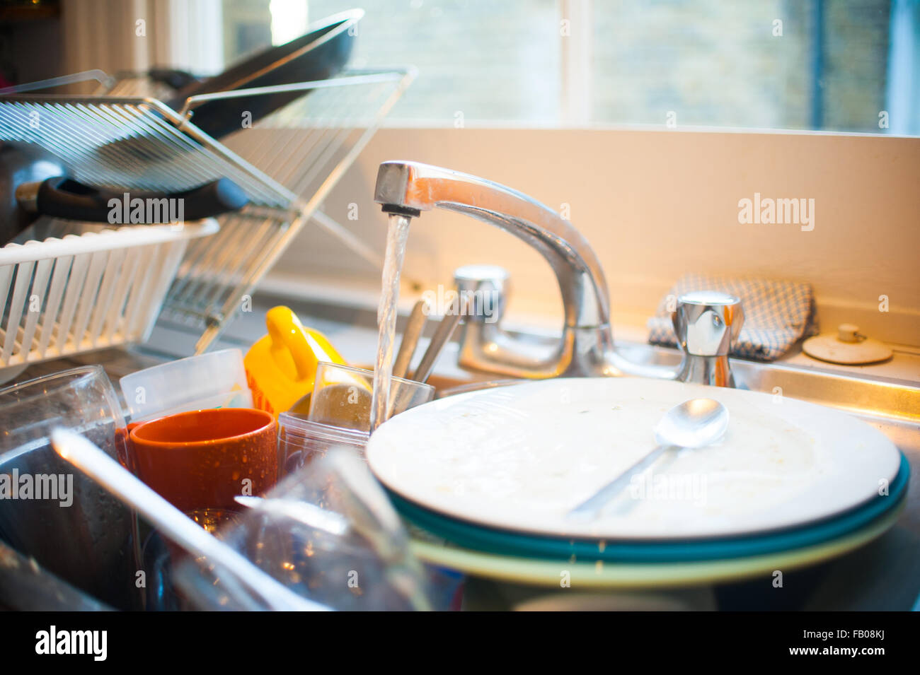 Dirty dishes in sink Stock Photo - Alamy