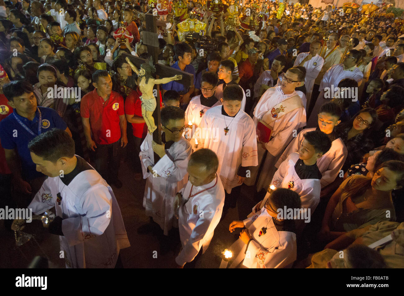 Cebu City, Philippines. 07th Jan, 2016. Following a dawn procession starting at 4:30 am, thousands of Filipino Catholics flock to the oldest Roman Catholic Church in the Philippines - the Basilica Minore del St.Nino in Cebu City. The event marks the official start of the Fiesta Señor - a nine day religious festival honouring the Santo Nino De Cebu (Holy Child of Cebu) Many devotees bring with them a Santo Nino figurine representing the Child Jesus. Credit:  imagegallery2/Alamy Live News Stock Photo