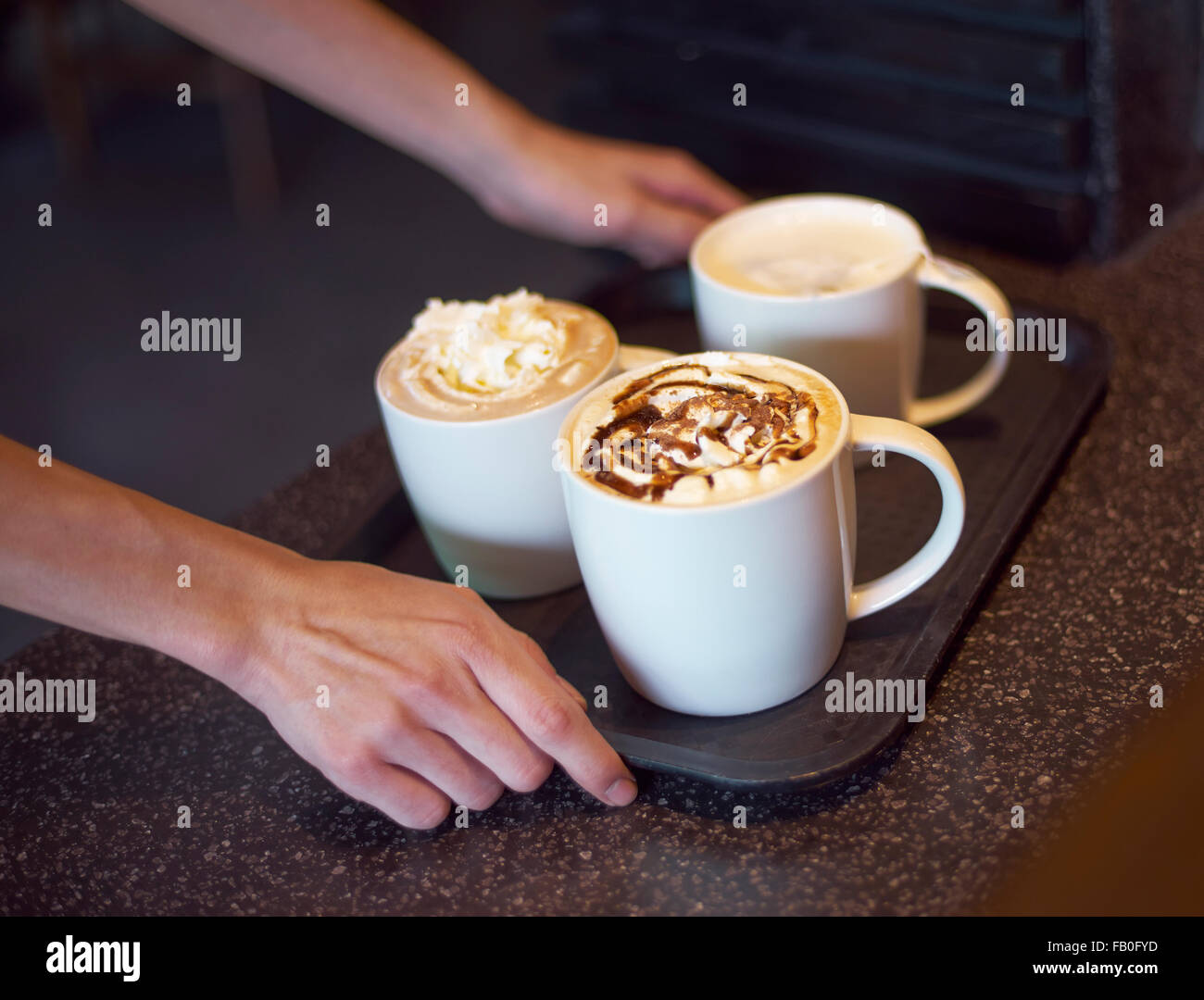 coffee shop server delivering coffee Stock Photo Alamy