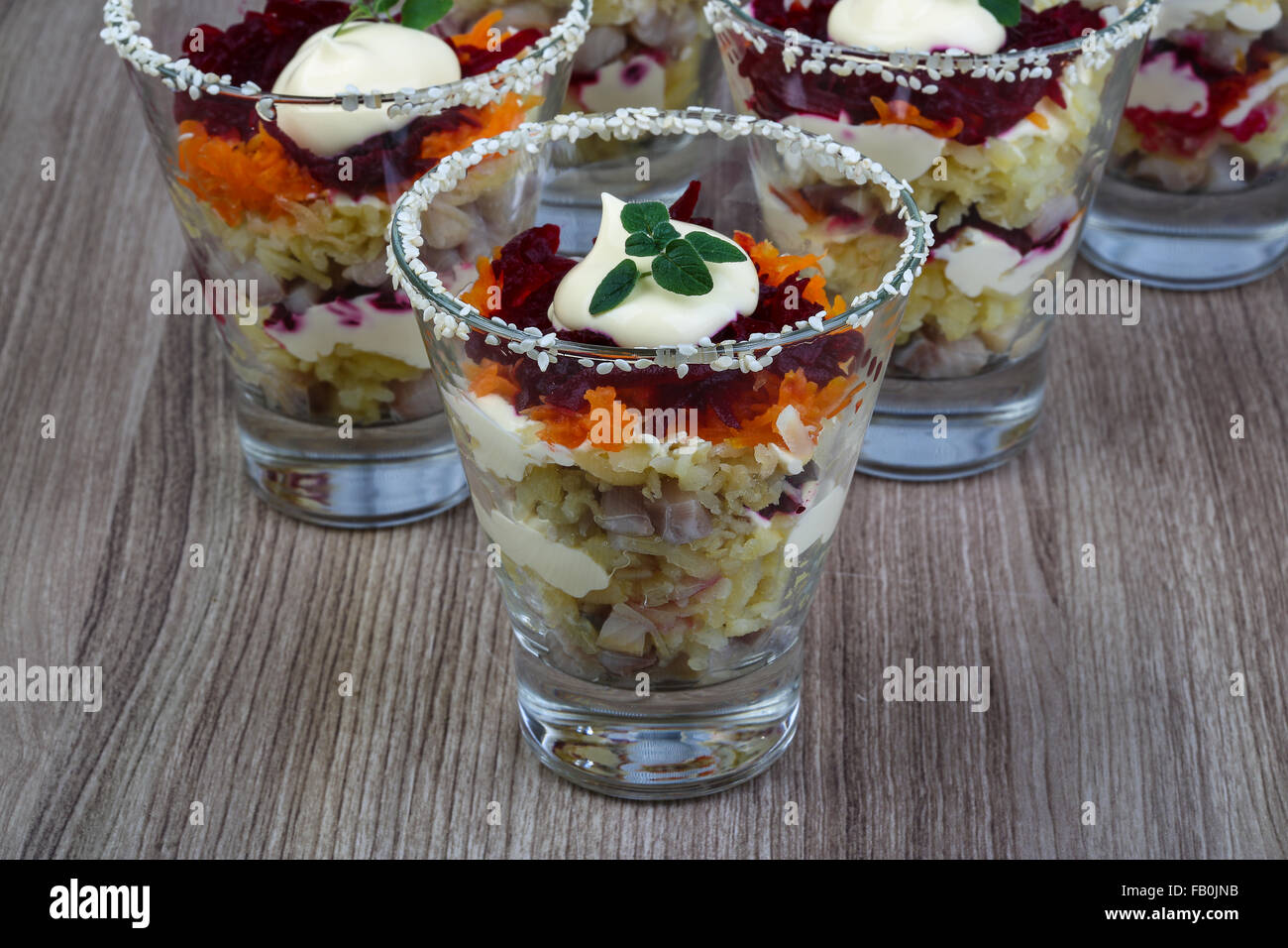 Russian herring salad with beet, potato, carrot and mayonnaise Stock