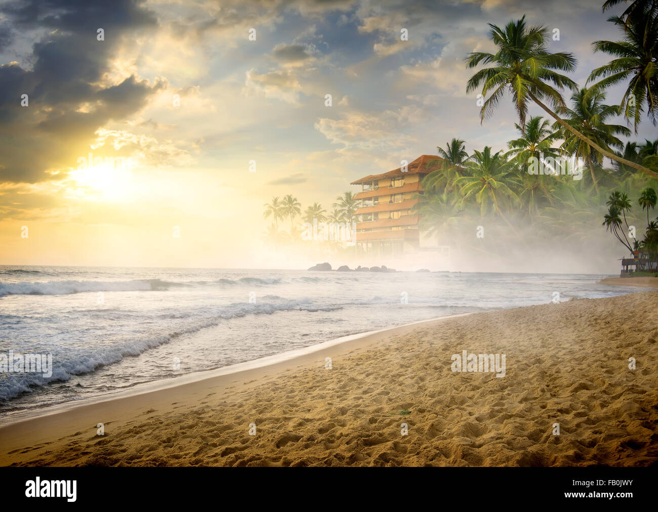 Morning fog over sandy beach of the ocean Stock Photo